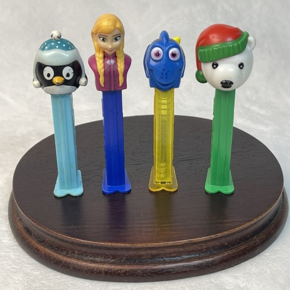 Lot of 4 PEZ Dispensers w/‎ Feet Frozen Anna Dory Chilly Willy Polar Bear